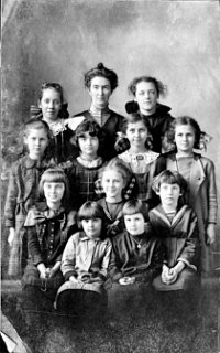 Grace Durst is rear left of the teacher.